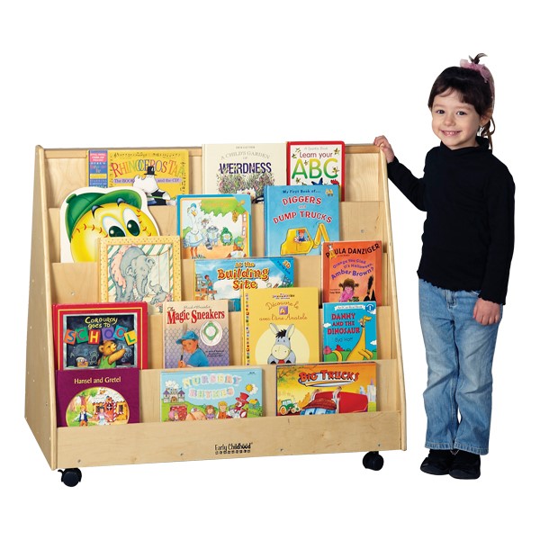 Child standing next to Double-Sided Book Display